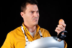 http://www.dreamstime.com/royalty-free-stock-photos-confused-househusband-image18388368